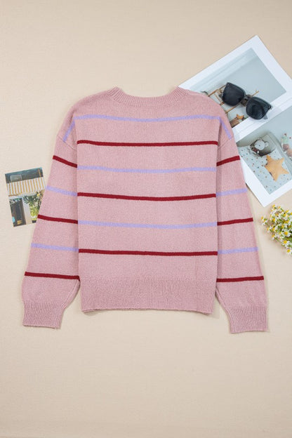 Stripe Ribbed Trim Drop Shoulder Sweater in pink with red stripes displayed flat against a beige background.