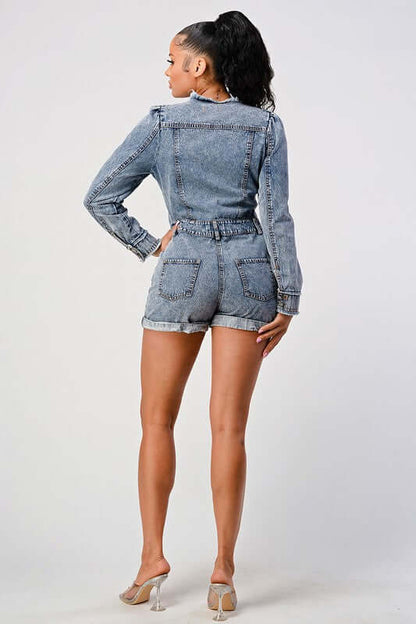 long sleeve denim romper showcasing the back view with cinched waist and classic blue wash.