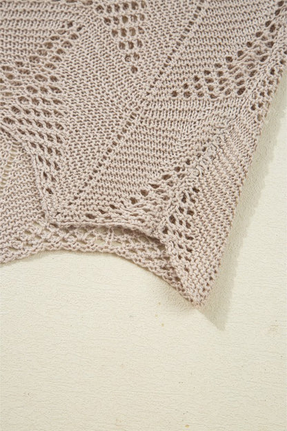 Close-up of knit texture on Ava 8 Sleeve Casual Sweater, showcasing breezy hollow out design.