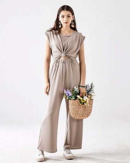Open Front Wide Leg Jumpsuit featuring a trendy twist-front design and side pockets for essentials.