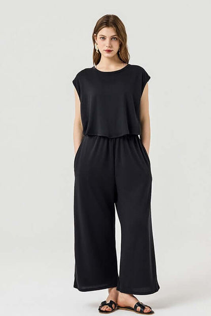Open Front Wide Leg Jumpsuit in black with relaxed wide-leg design and side pockets, perfect for casual wear.