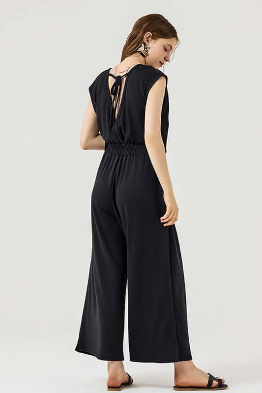 Open Front Wide Leg Jumpsuit featuring a relaxed fit and stylish back design.