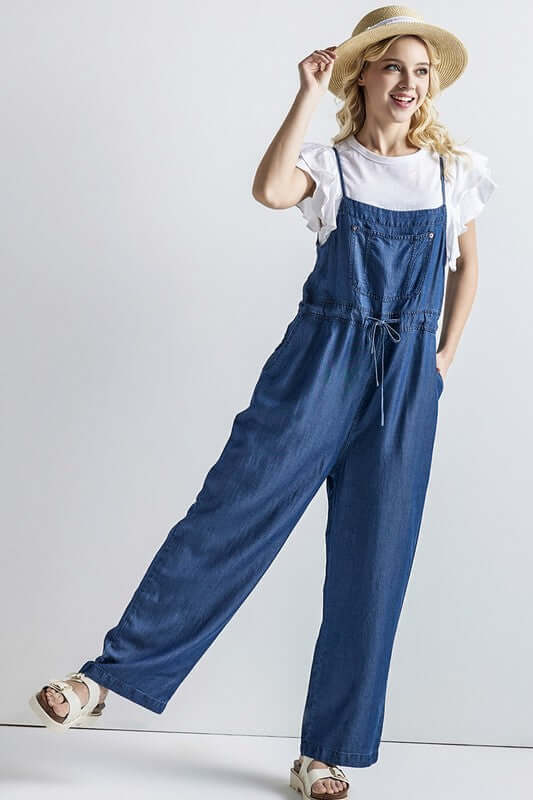 Model wearing a Plus Pocket Adjustable Straps Overall Jumpsuit with a casual and chic style.
