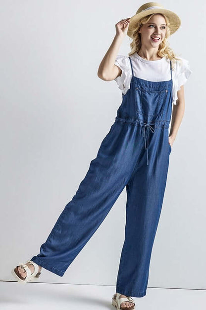 Model wearing a Plus Pocket Adjustable Straps Overall Jumpsuit with a casual and chic style.