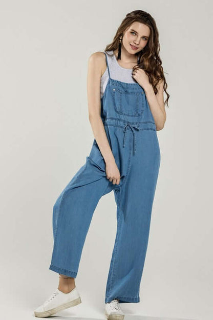 Plus Pocket Adjustable Straps Overall Jumpsuit in breathable denim, featuring adjustable straps and front pockets.