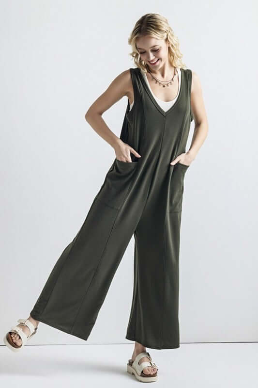 Oversized Patched Pocket V-Neck Jumpsuit displayed on model in olive green with oversized pockets and wide-leg pants.