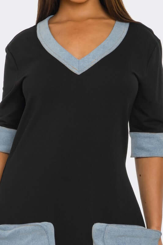 Denim Accent Jumpsuit featuring a V-neckline and denim-trimmed sleeves for stylish comfort.