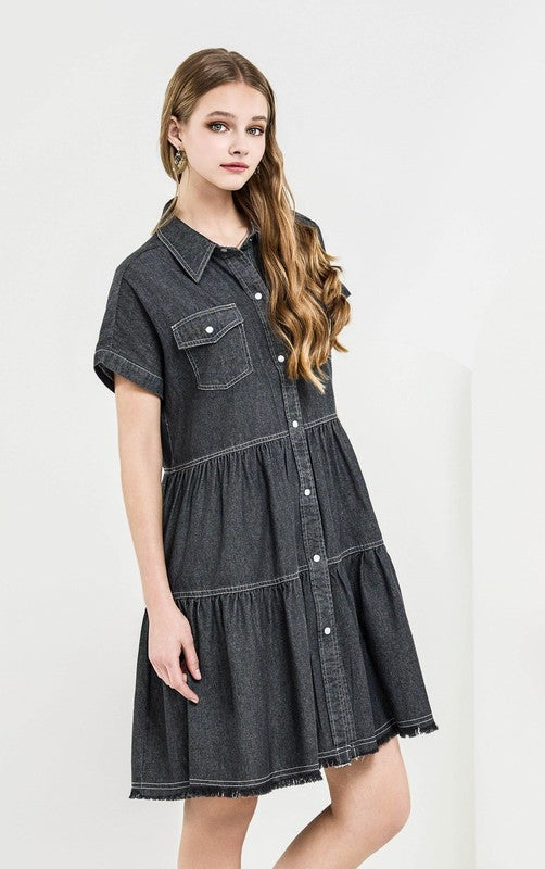 Button Down Tiered Babydoll Denim Shirt Dress on model, showcasing its chic design and versatile styling.