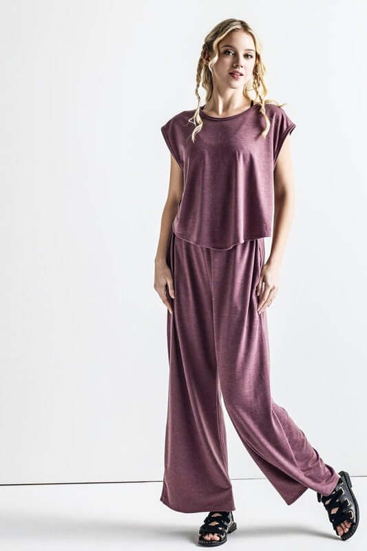 Open Front Wide Leg Jumpsuit in relaxed wide-leg design. Trendy twist-front & pockets for essential items.