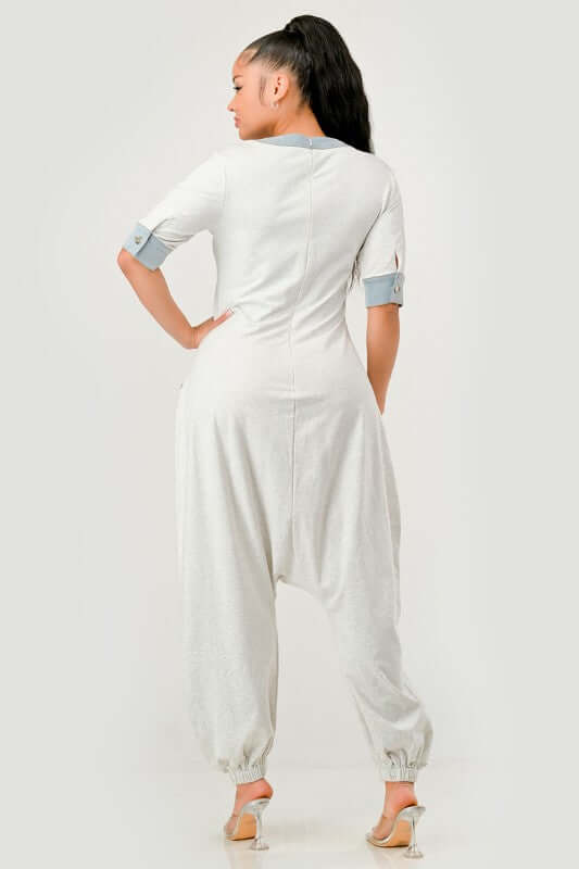 Back view of Denim Accent Jumpsuit showcasing relaxed fit and stylish denim accents.