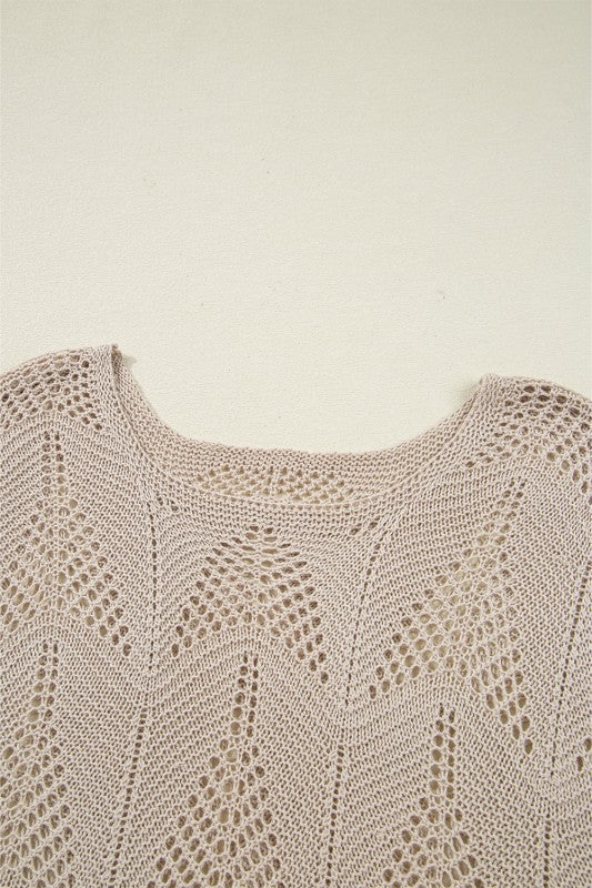Close-up of the stylish hollow out knit design on the Ava 8 Sleeve Casual Sweater for women, showcasing its breezy and trendy texture.