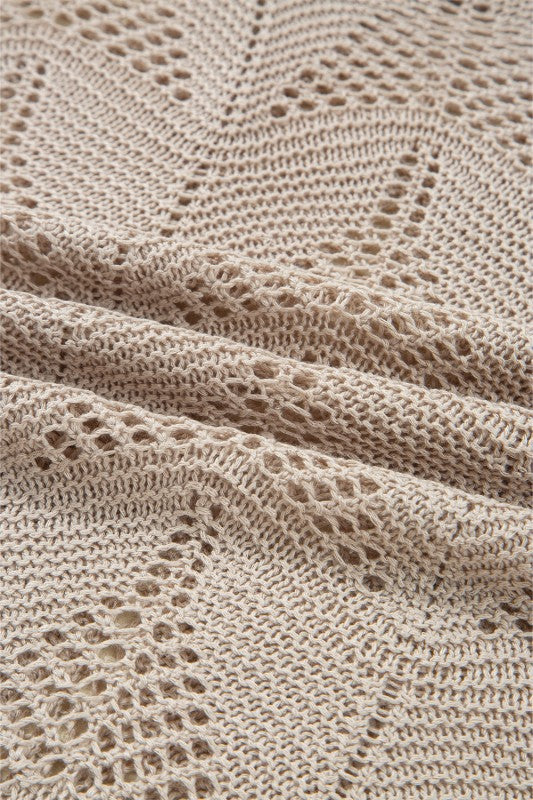 Close-up of hollow out knit design on Ava 8 Sleeve Casual Sweater in soft, lightweight fabric for fall fashion.