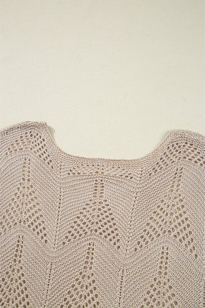 Close-up of Ava 8 Sleeve Casual Sweater's hollow out knit design, showcasing intricate patterns and soft fabric.