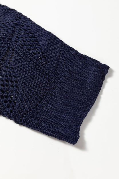 Close-up of navy knit sleeve on Ava 8 Sleeve Casual Sweater with hollow out design for stylish fall fashion.