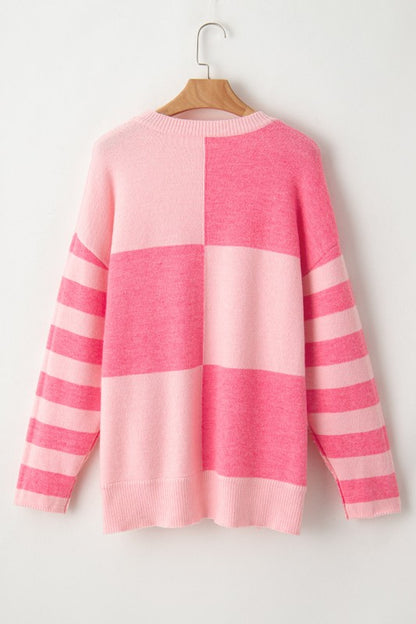 Abigail High Low Loose Sweater in pink with colorblocking and striped pattern, modern high-low hem, perfect casual wear.