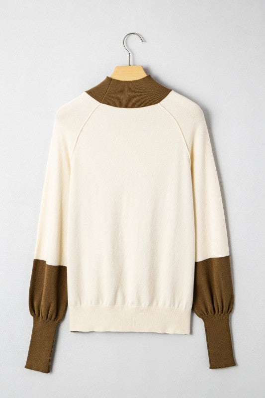 Alt Tag: Colorblock Raglan Puff Sleeve Mock Neck Sweater in white and brown on hanger