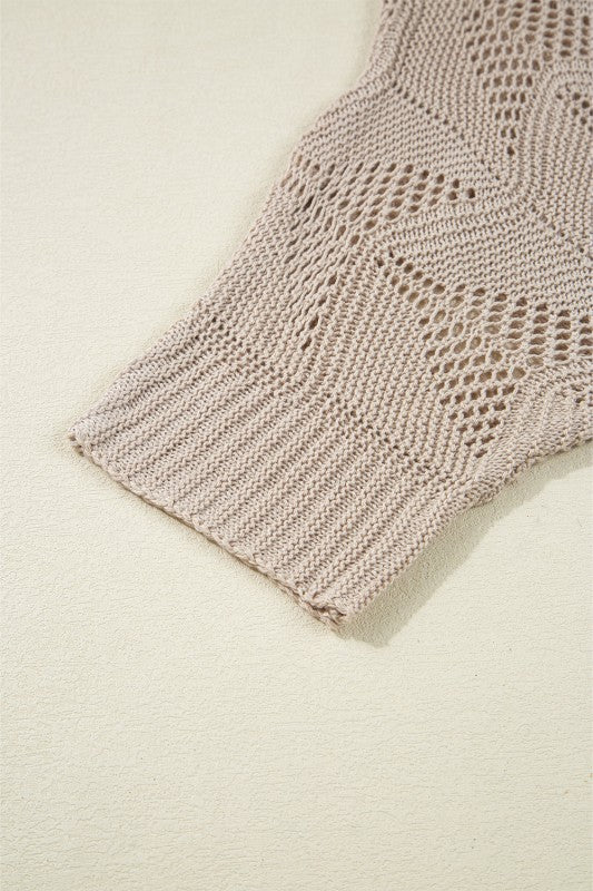 Close-up of Ava 8 Sleeve Casual Sweater showcasing hollow out knit design and 7/8 sleeve for a trendy look.