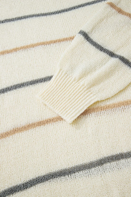 Close-up of Stripe Ribbed Trim Drop Shoulder Sweater fabric showcasing cozy stripes and ribbed cuff design.