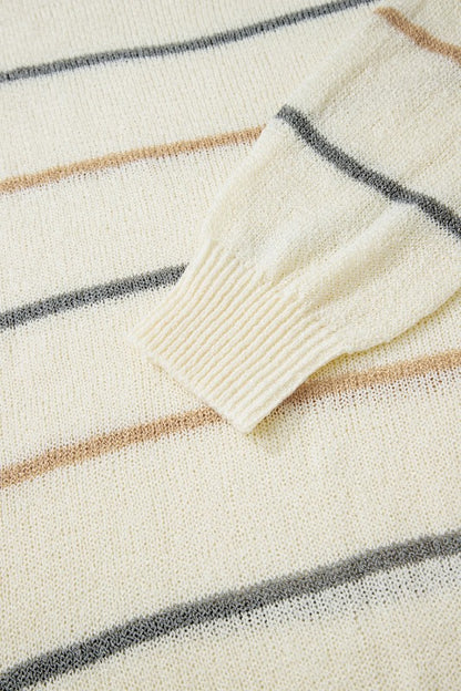 Close-up of Stripe Ribbed Trim Drop Shoulder Sweater fabric showcasing cozy stripes and ribbed cuff design.