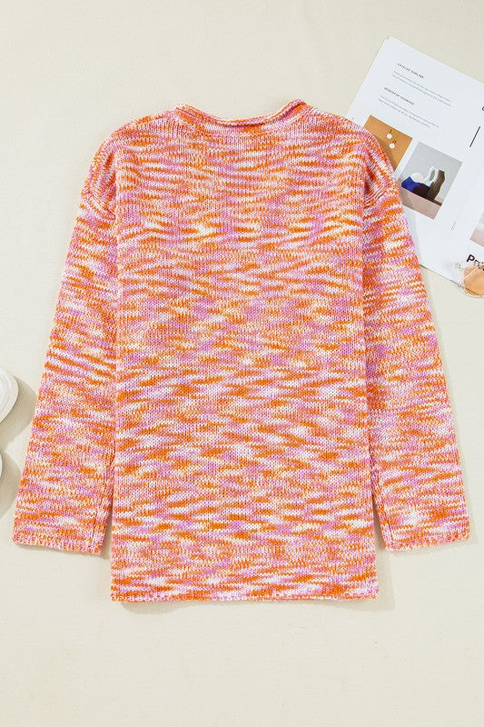 Sofia Shoulder Tunic Oversized Sweater with vibrant abstract pattern, showcasing its trendy back view against a neutral background.