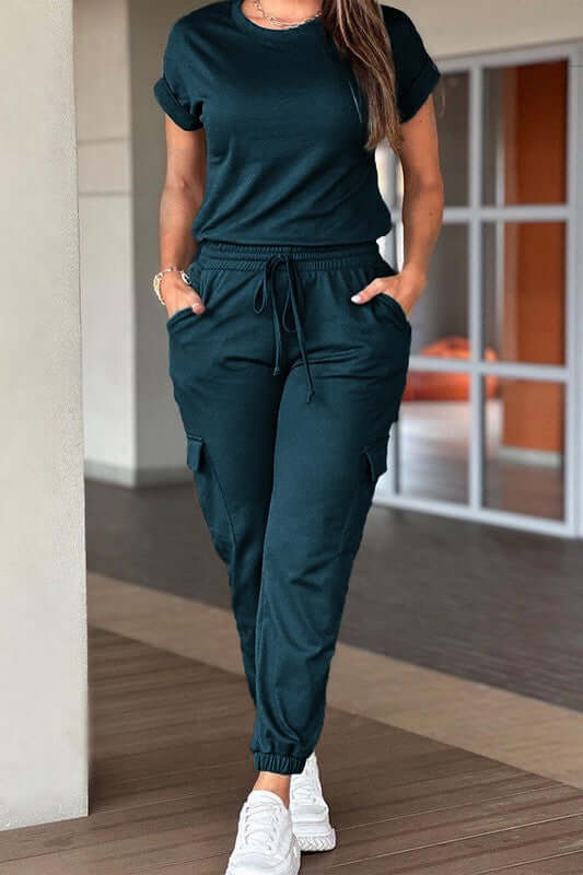 Crew Neck Short Sleeve Drawstring Waist Jumpsuit in dark green, perfect for casual outings and outdoor activities.