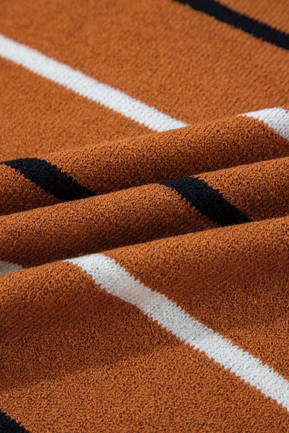 Close-up of Stripe Ribbed Trim Drop Shoulder Sweater fabric with striped pattern and ribbed texture for a trendy look.