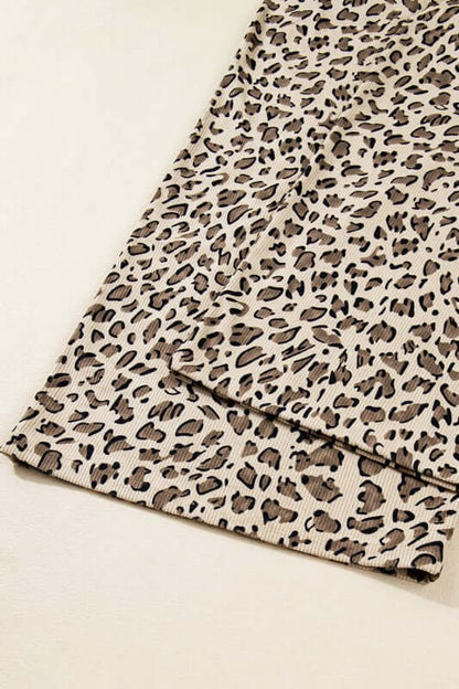 Leopard print fabric detail for the Leopard Bib Wide Leg Jumpsuit, showcasing its trendy design.