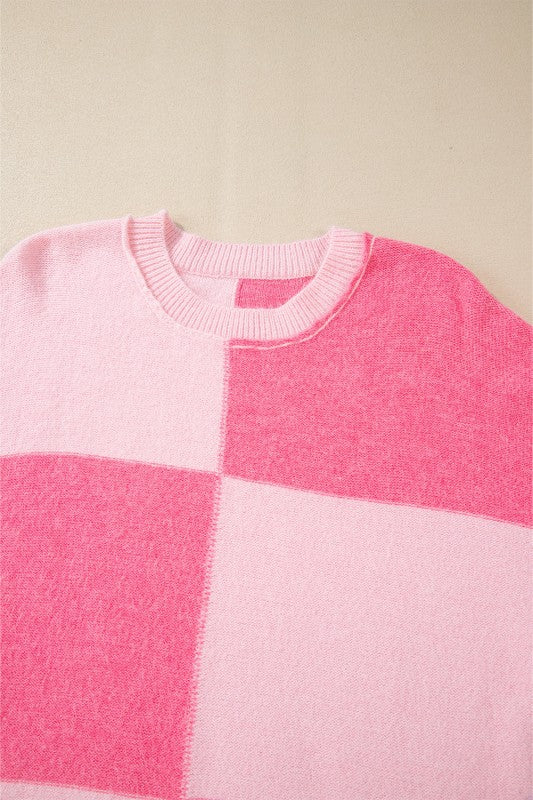 Abigail High Low Loose Sweater in pink with colorblocking and striped pattern for an eye-catching, feminine style and modern silhouette.