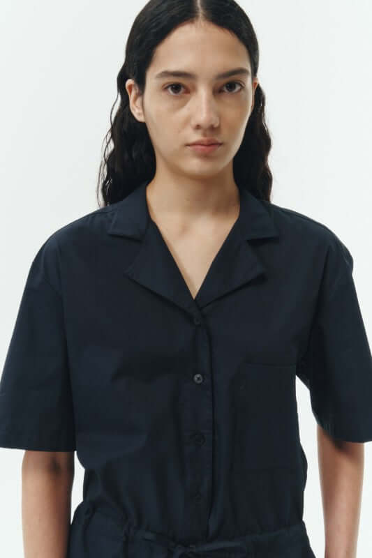 Emma Solid Jumpsuit featuring breathable woven cotton and a camp collar design, perfect for all-day comfort.